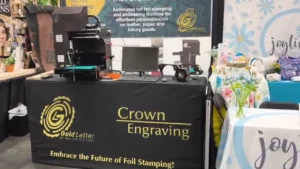 Gold Letter booth at CPE Summer 2025 showcasing its digital foil stamping machine